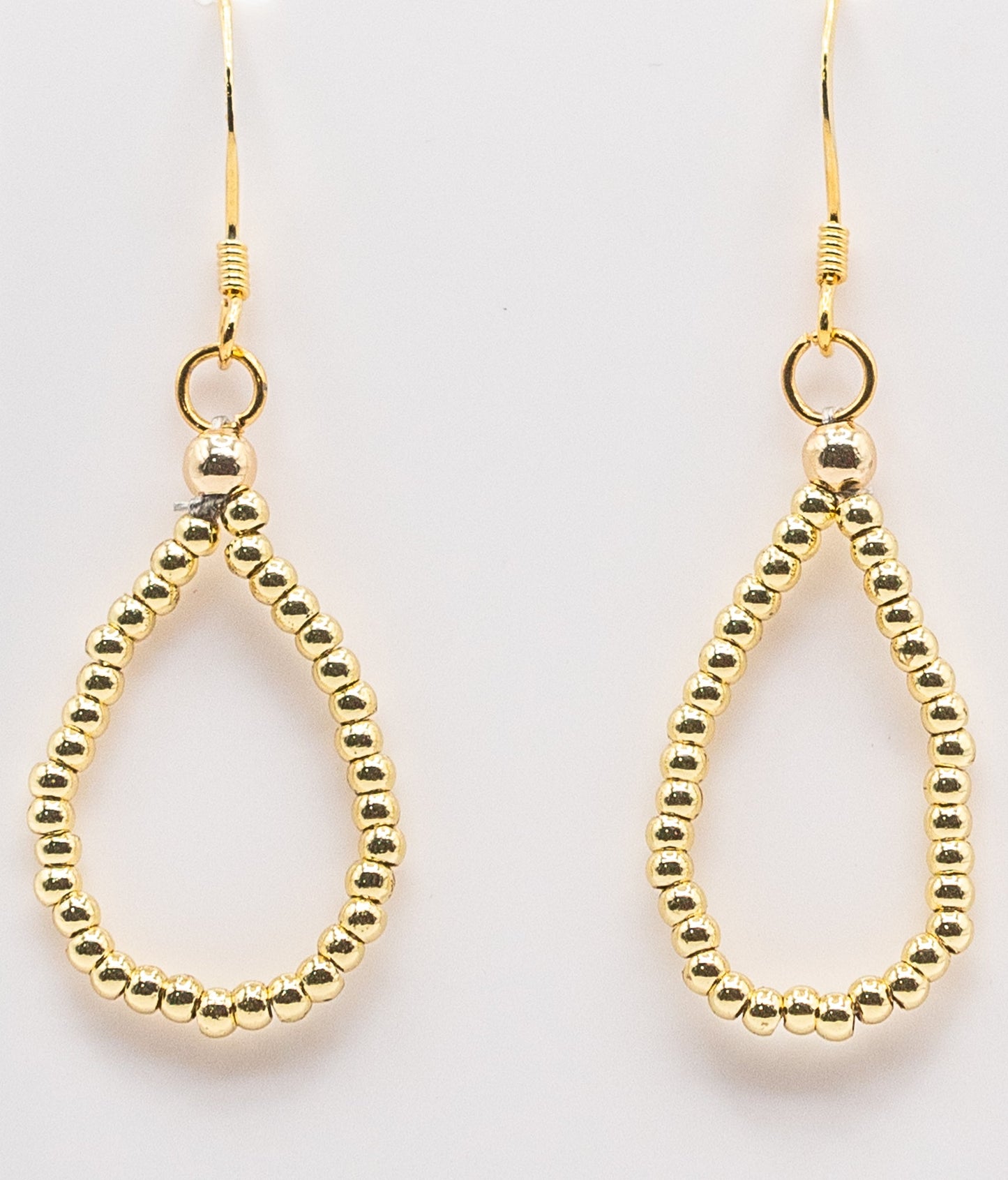 Tiny Yellow Gold-filled Hoops