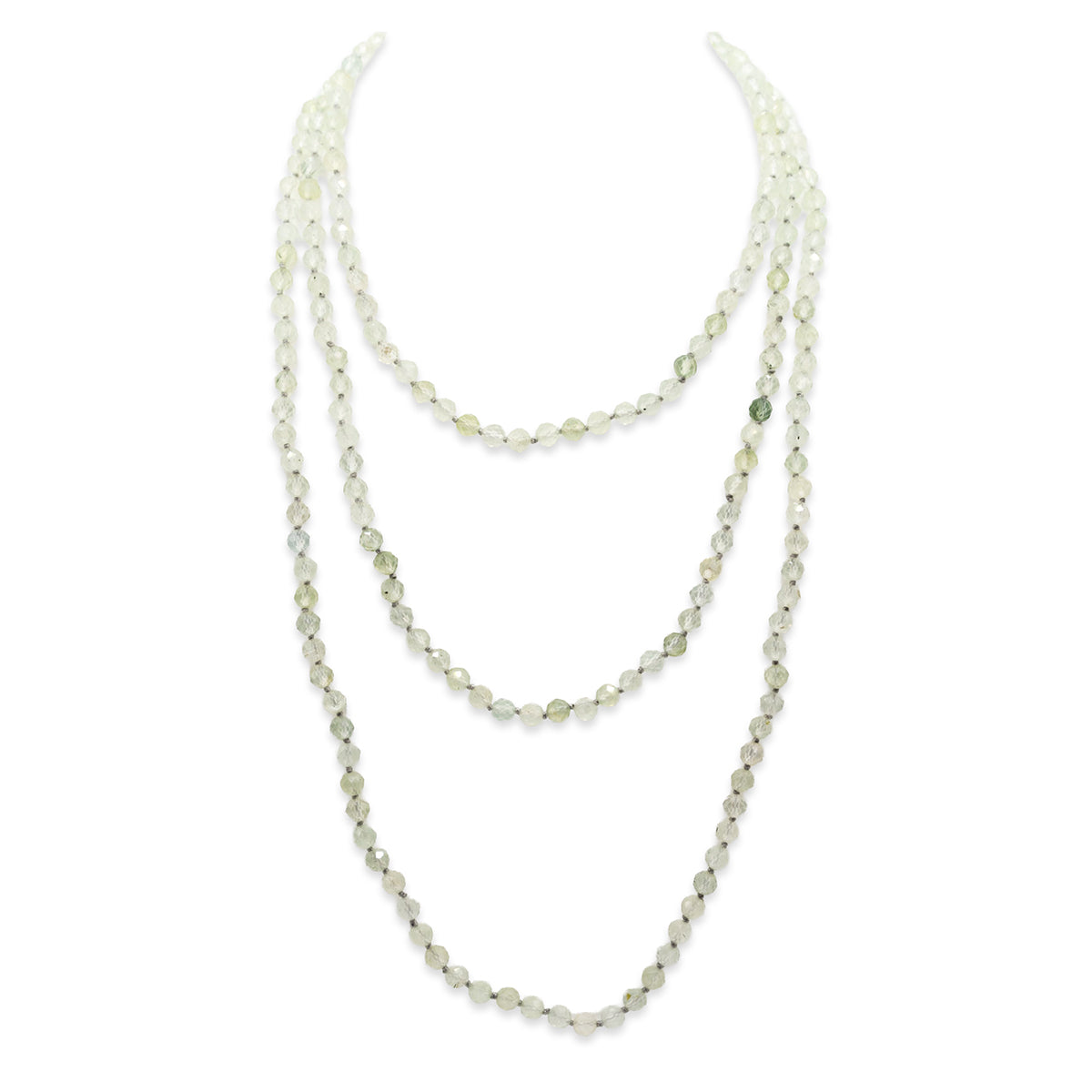 Two layered pearl necklaces on a white background