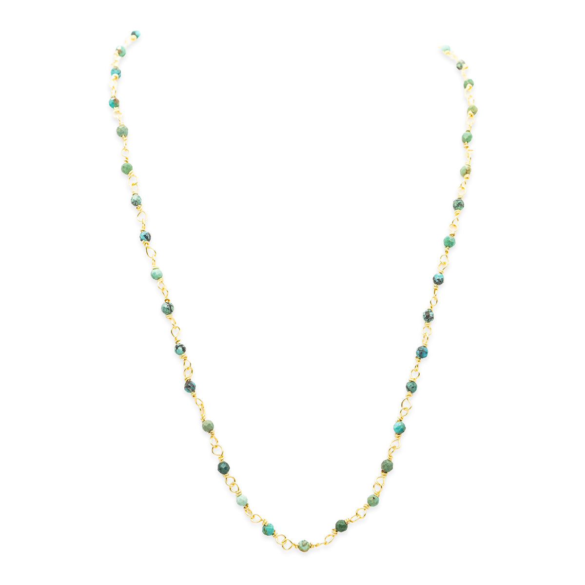 Necklace with green beads on a white background