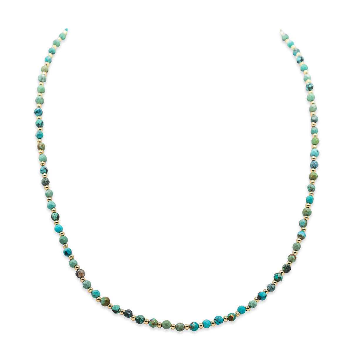 Necklace with turquoise and gold beads on a white background