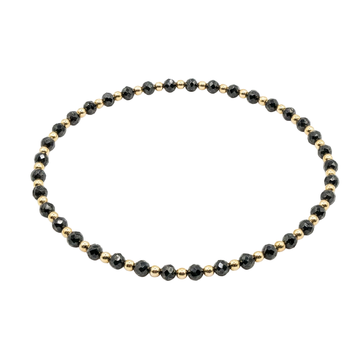 Necklace with alternating black and gold beads on a white background
