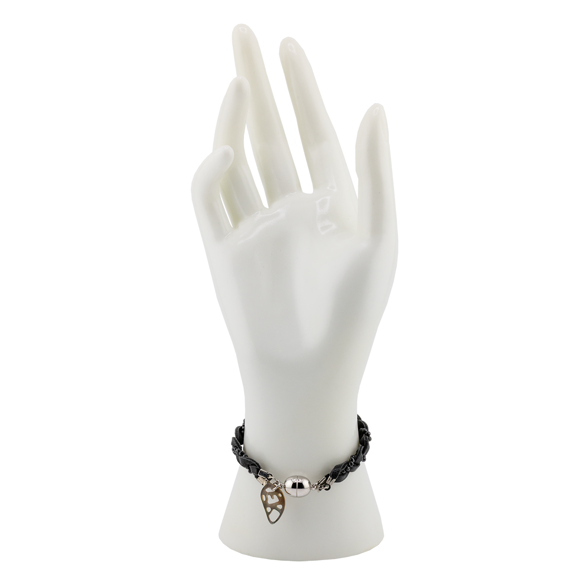 Bracelet with a leaf charm on a white mannequin hand against a white background