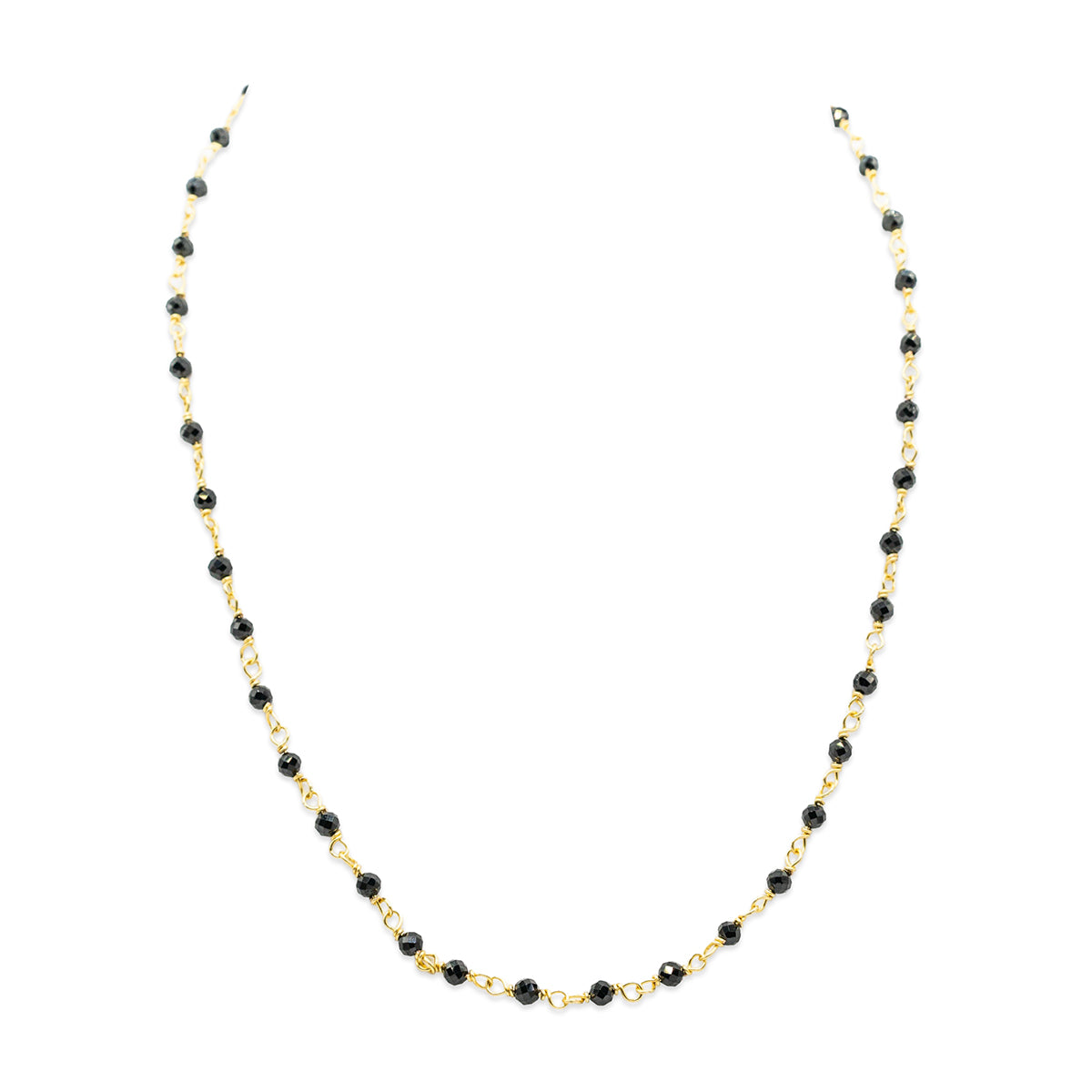 Necklace with black beads on a white background