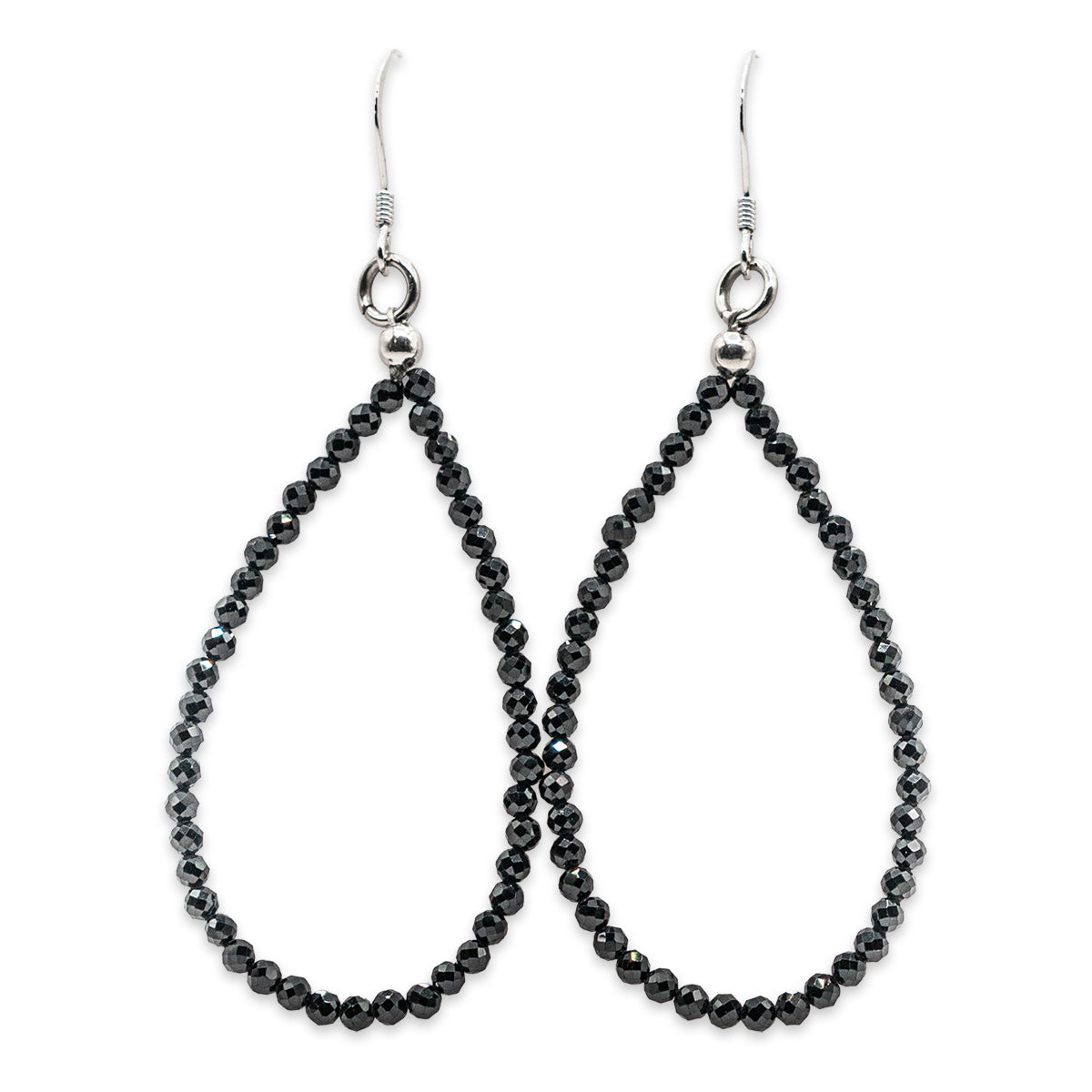 Pair of black beaded teardrop earrings on a white background