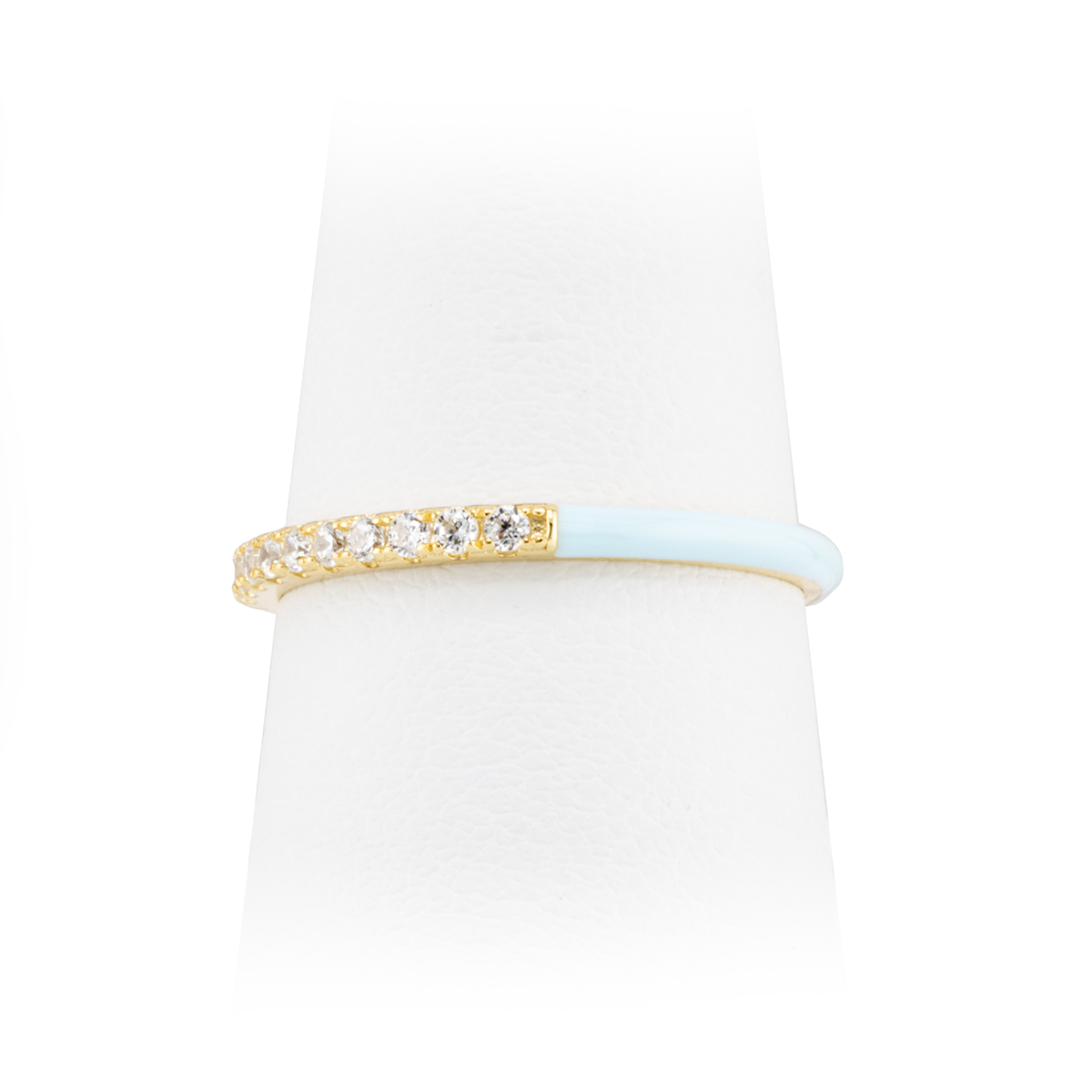 Gold ring with small diamonds on a white background