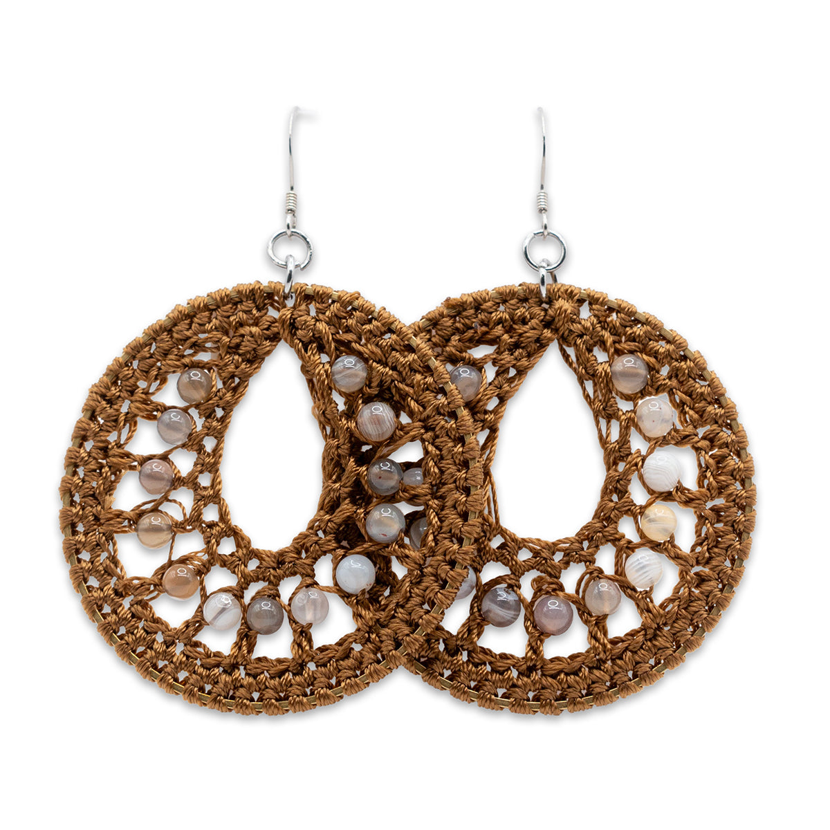 Brown crochet earrings with stone-like bead centers on a white background