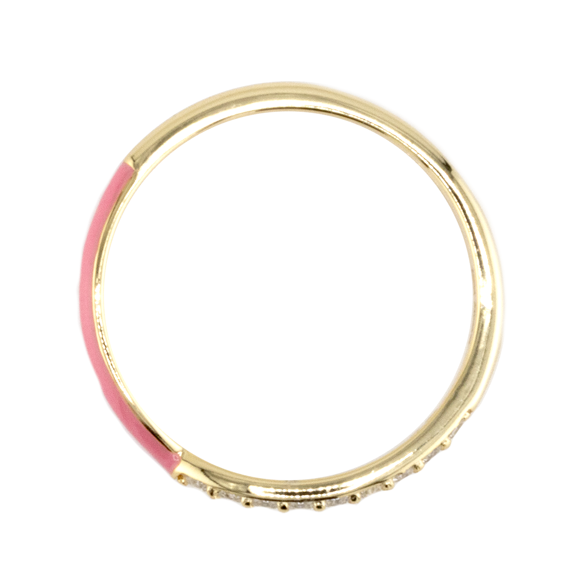 Gold ring with pink interior on a white background