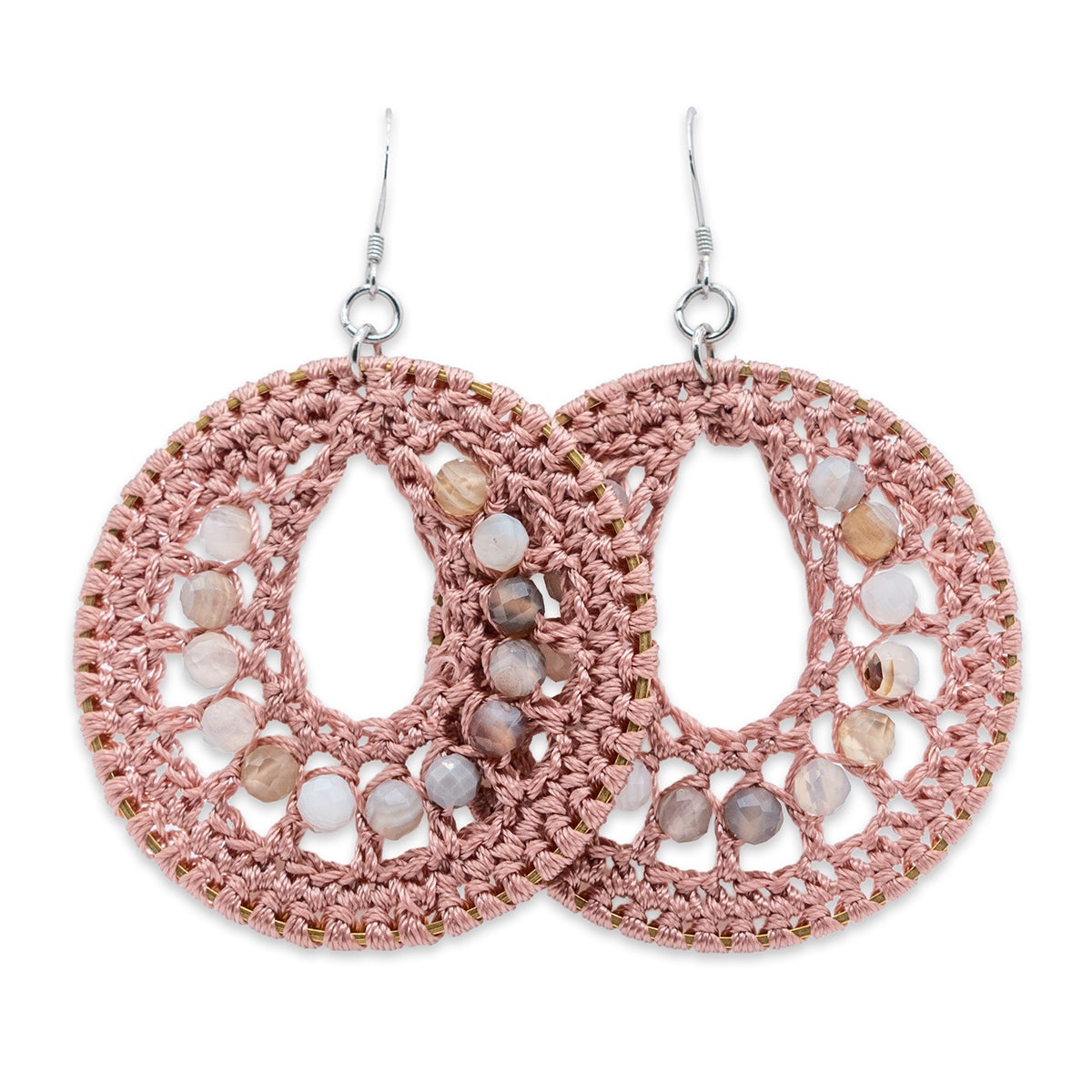 Pink crochet earrings with bead embellishments on a white background
