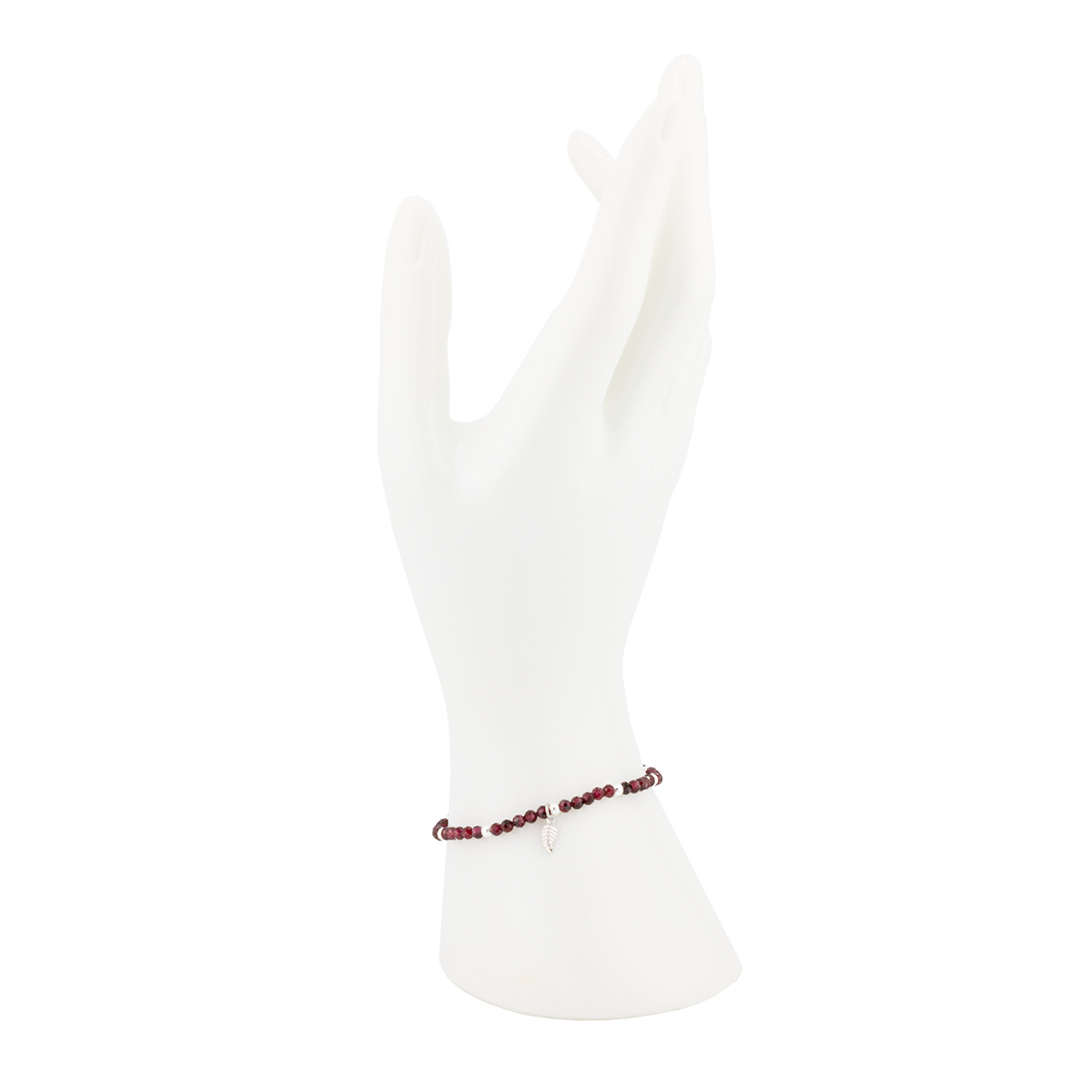 White socks with a red beaded anklet on a white background