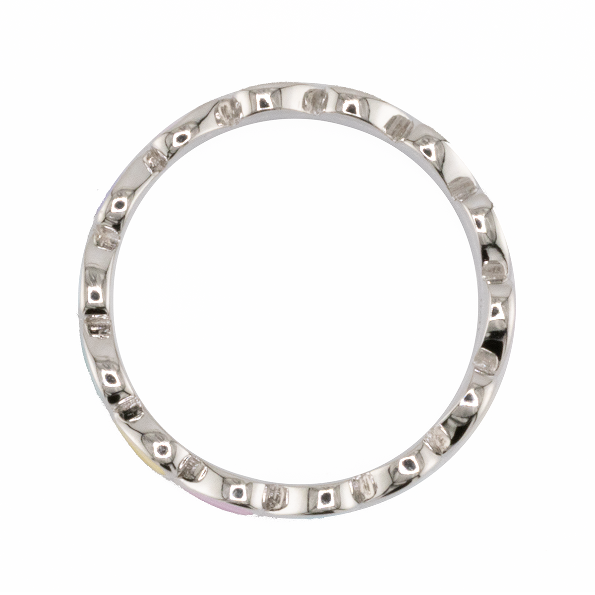 Silver ring with small stones on a white background