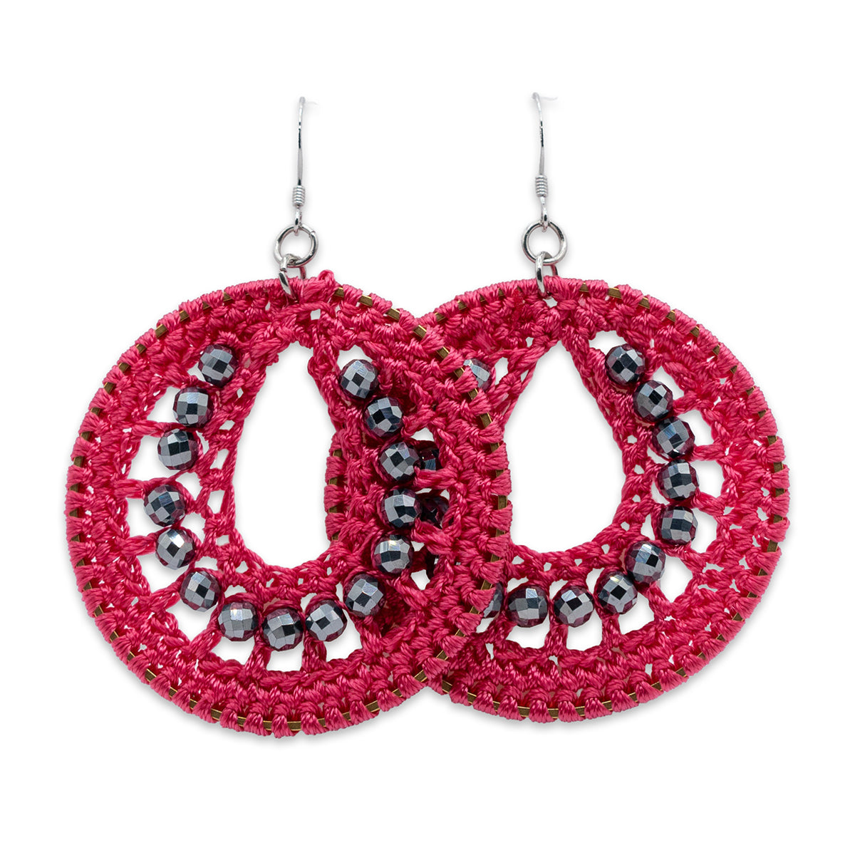 Pink crochet earrings with black bead accents on a white background