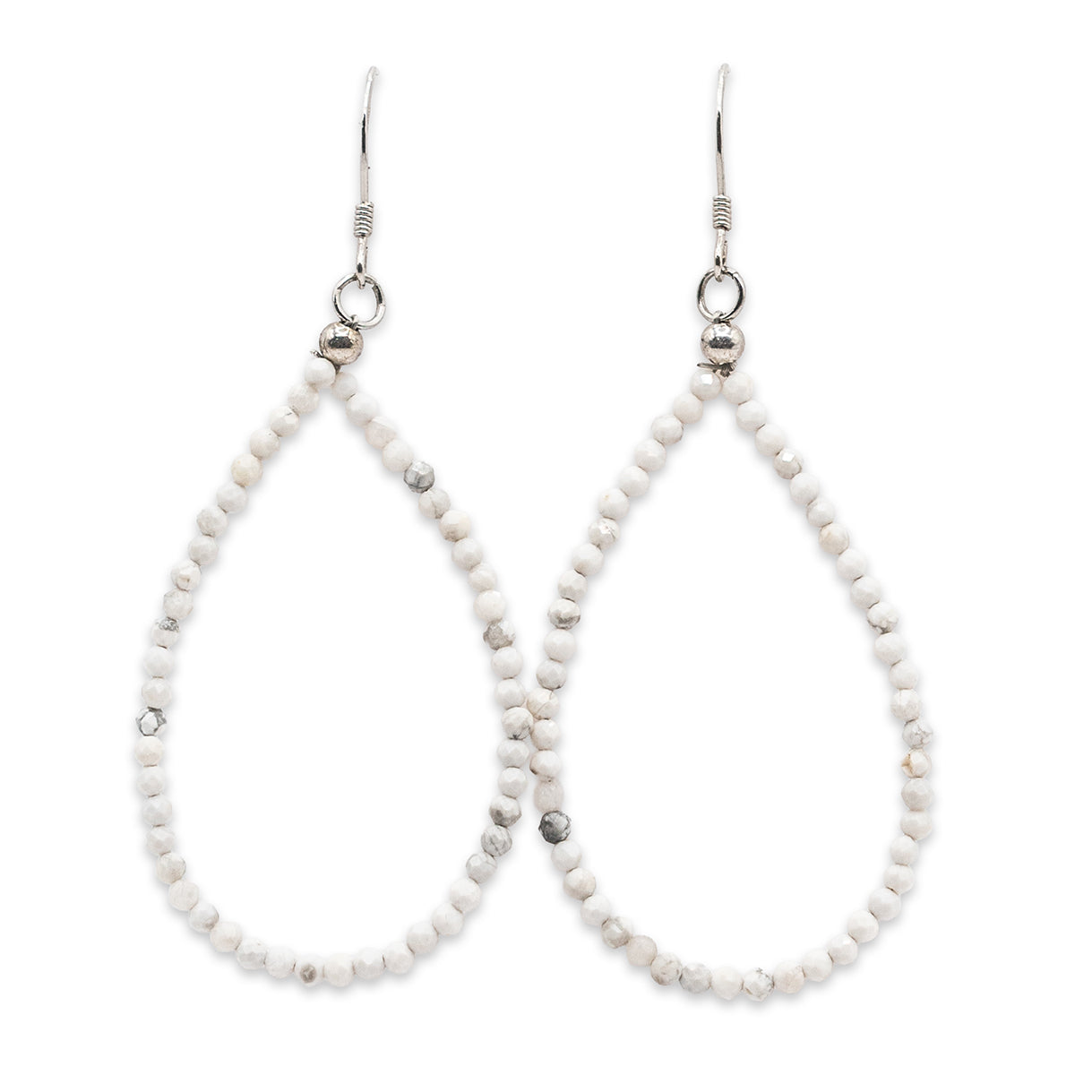 Teardrop-shaped beaded earrings on a white background