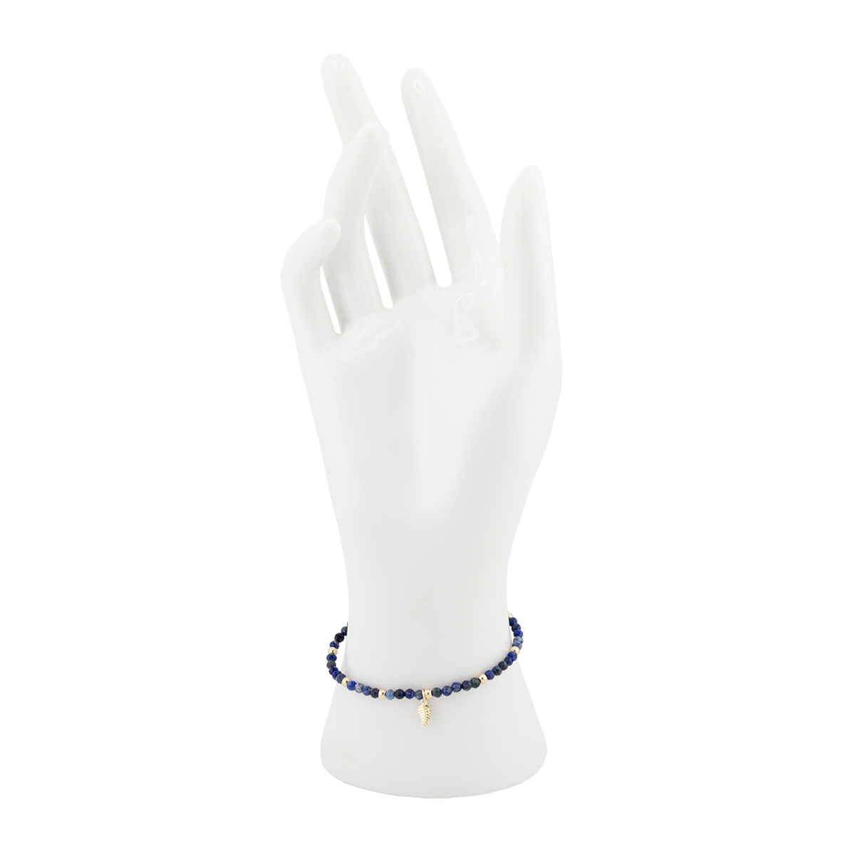 Mannequin hand wearing a blue beaded bracelet on a white background