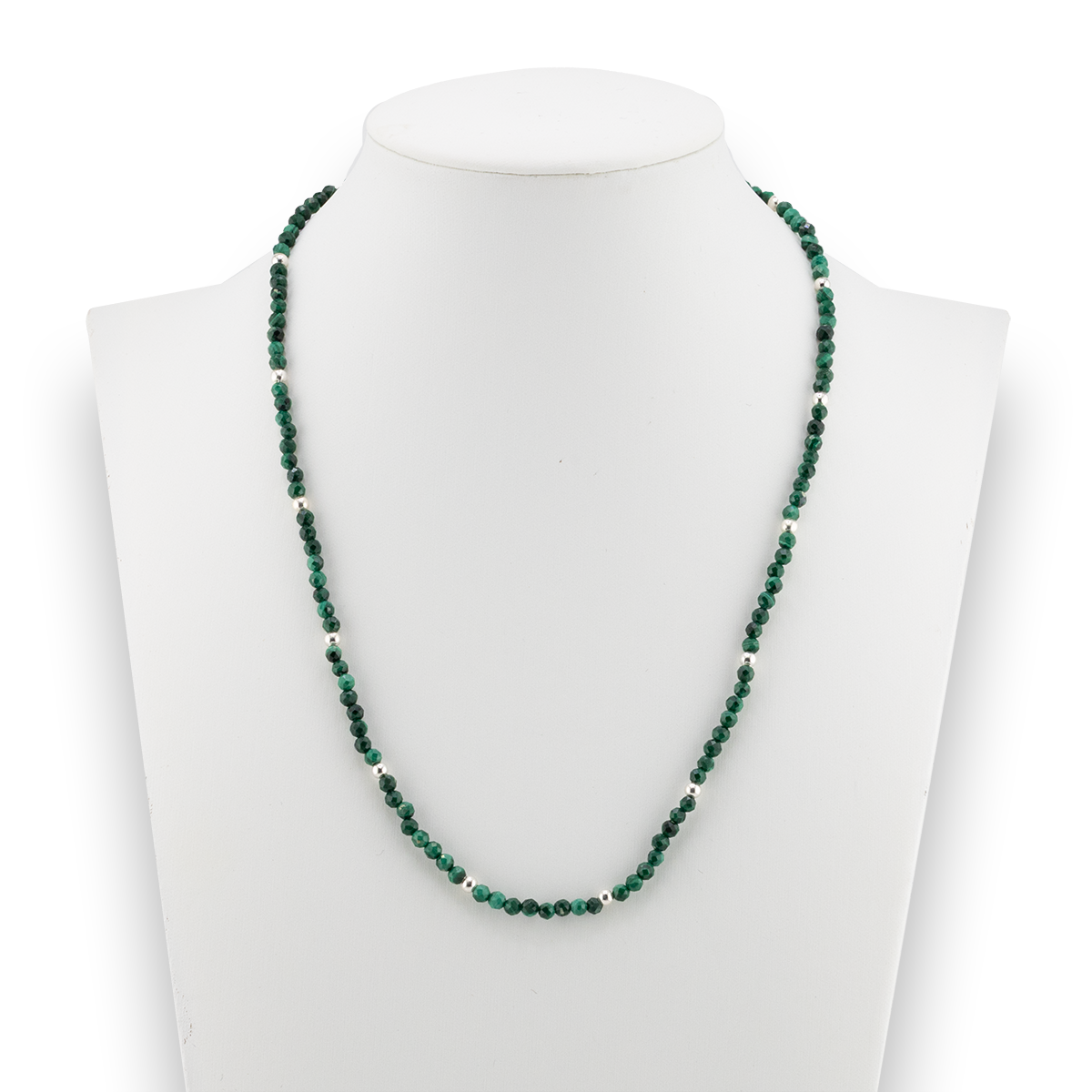 Green beaded necklace on a mannequin with a white background