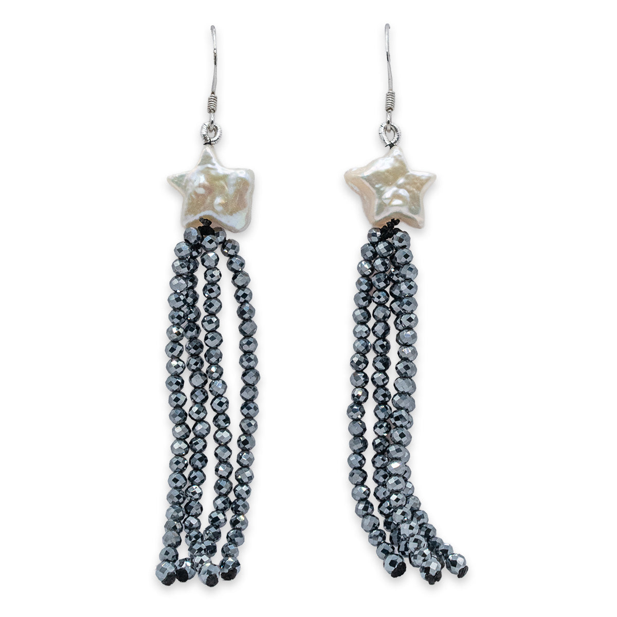 Pair of beaded earrings with star-shaped caps on a white background