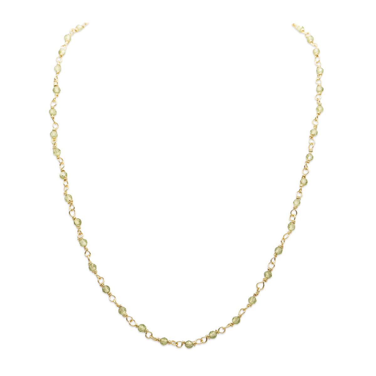 Gold necklace on a white background