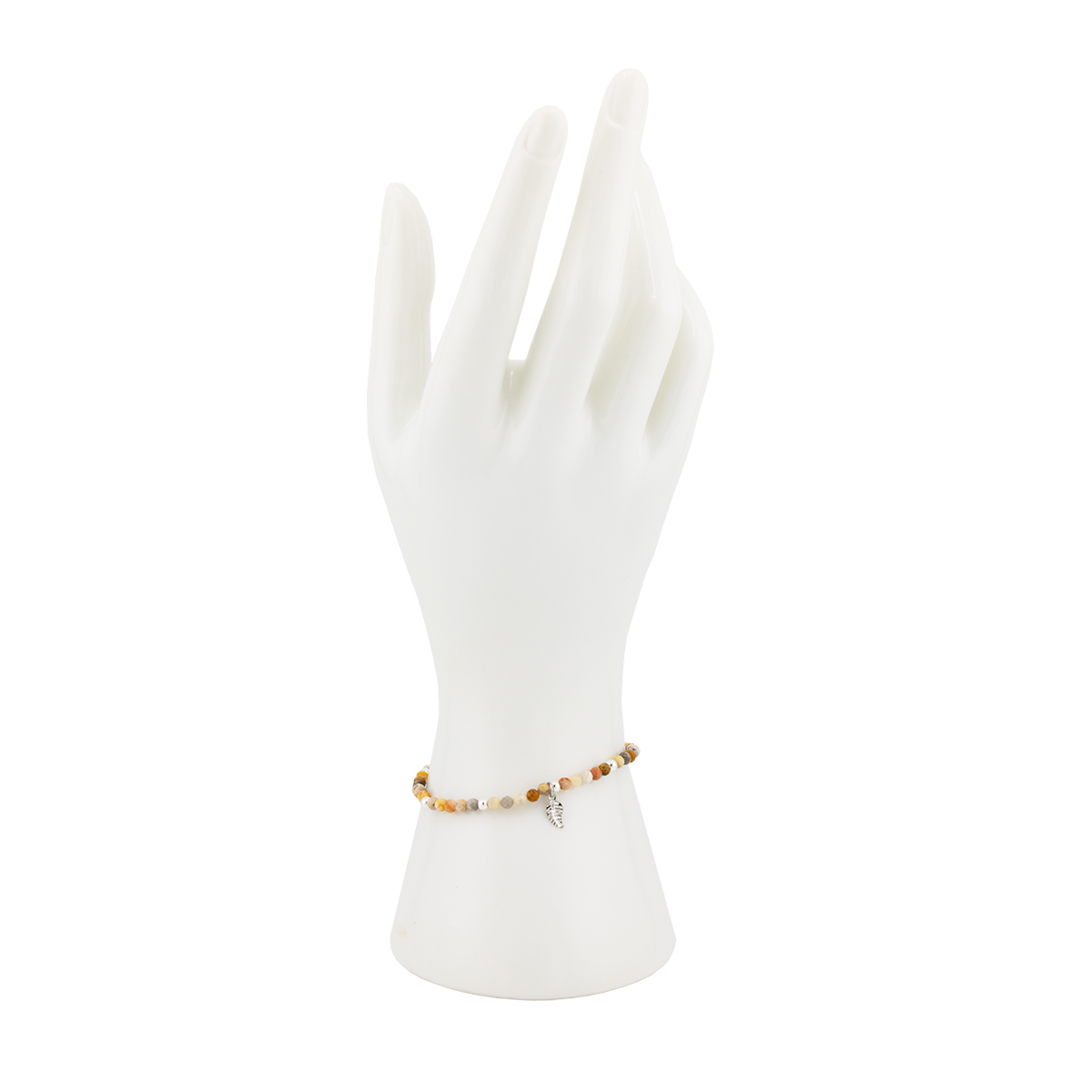 Bracelet on a white mannequin hand with a white background