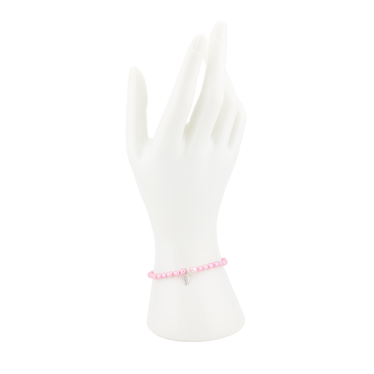 White dress on a mannequin with a pink bracelet on a white background