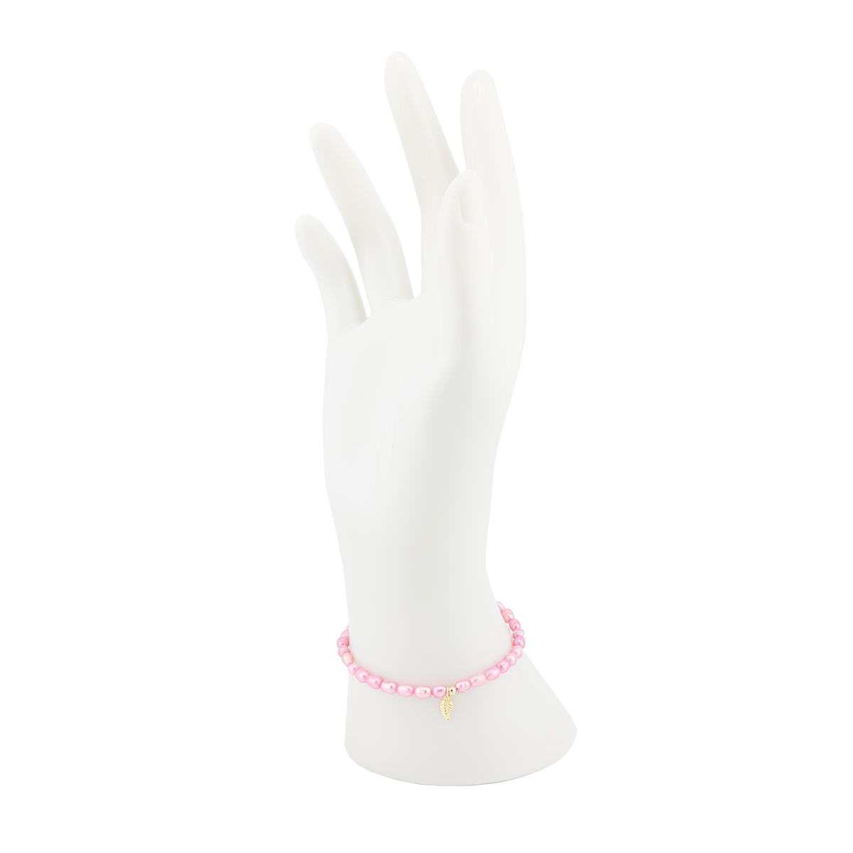 Pink beaded anklet on a white mannequin foot with a white background