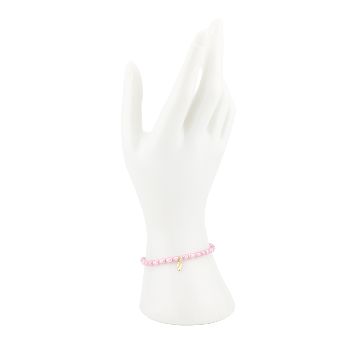 Pink beaded bracelet on a white mannequin arm with a white background