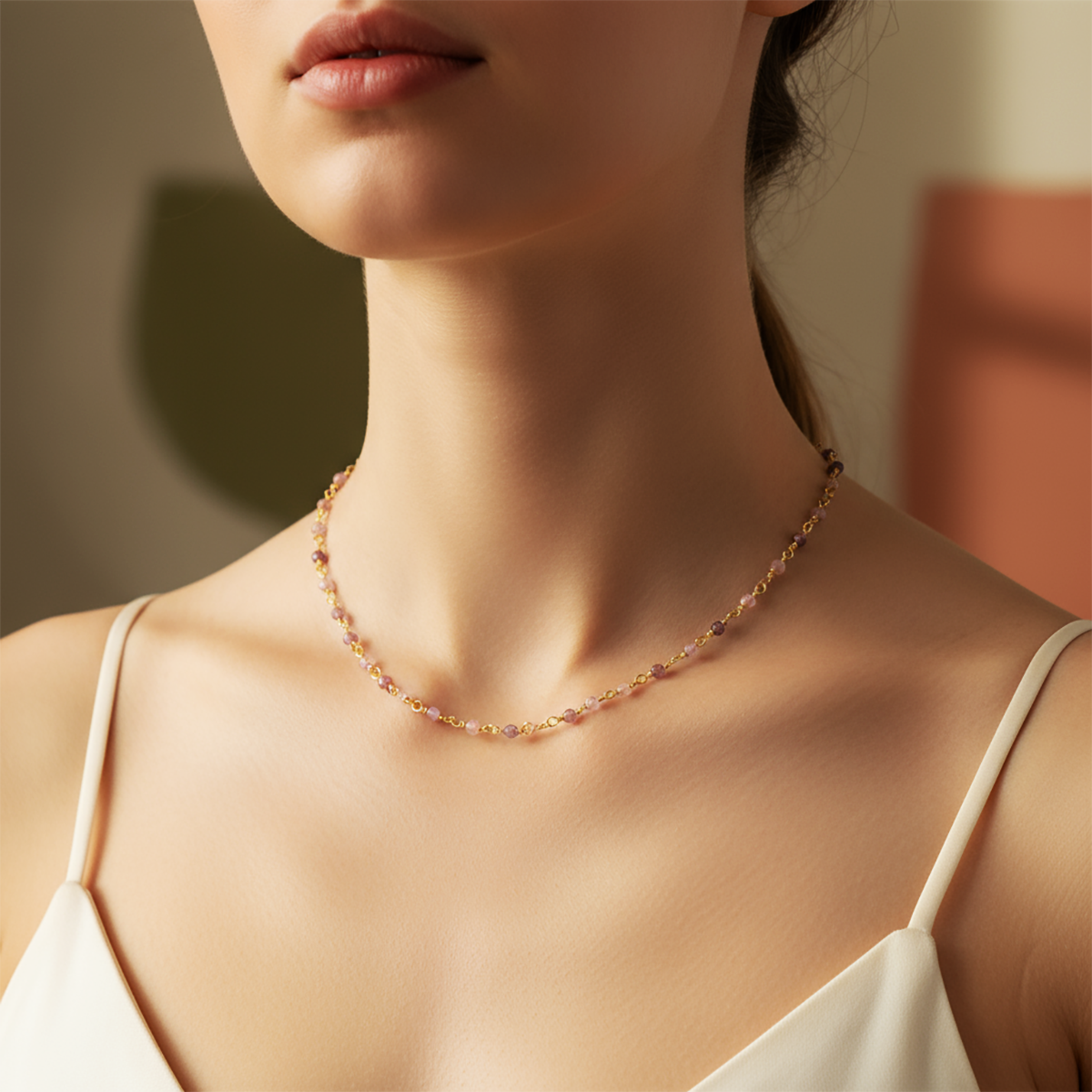 Necklace worn by a person with a neutral background