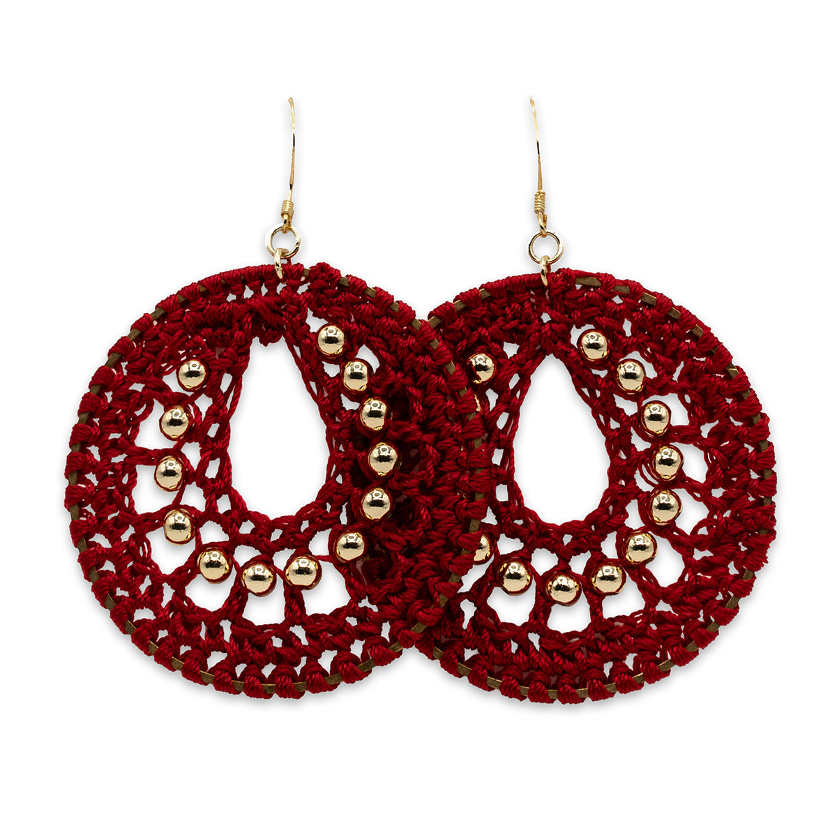Red crochet earrings with gold beads on a white background