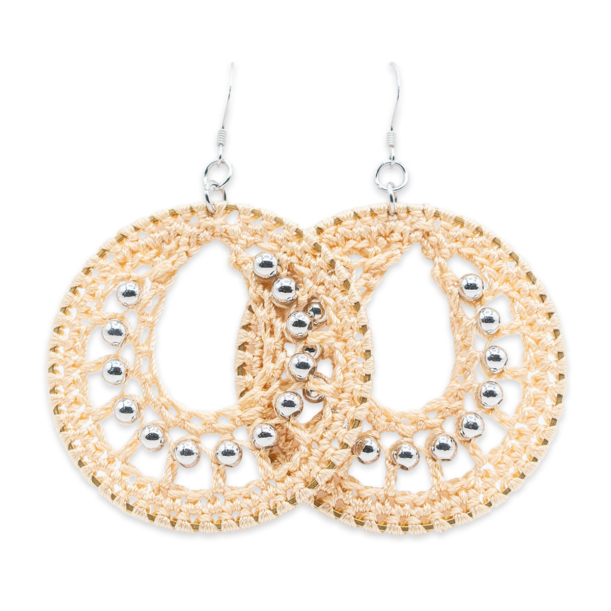 Gold and silver hoop earrings on a white background