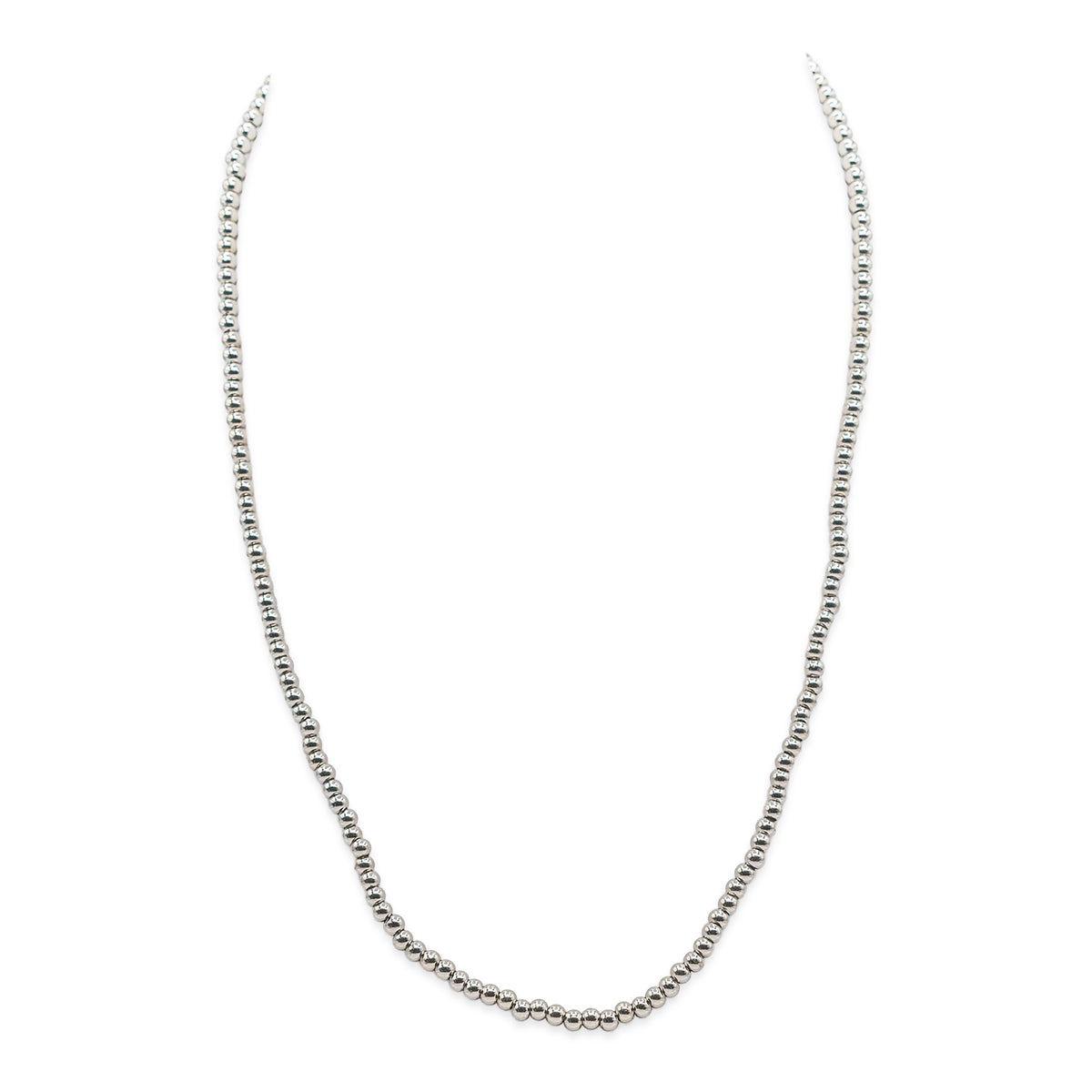 Silver chain necklace on a white background