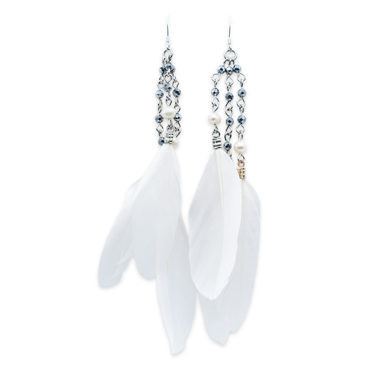 White feather earrings with beaded accents on a white background