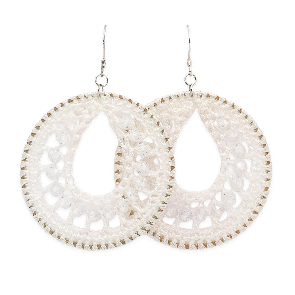 White lace earrings on a white background