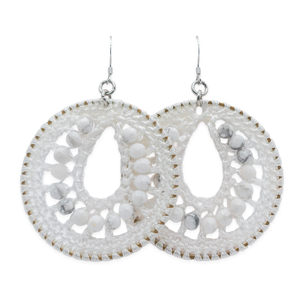 White lace earrings on a white background