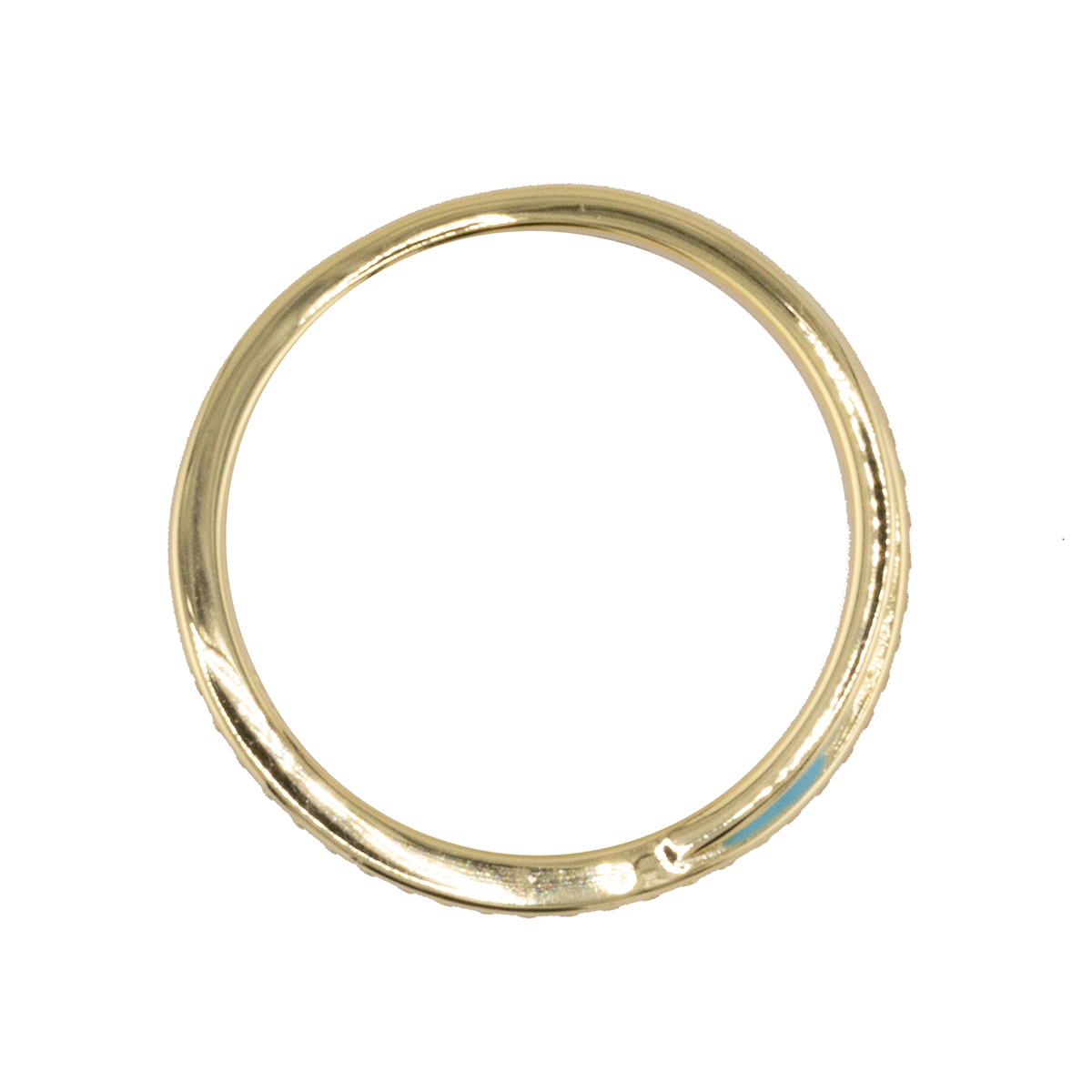 Gold ring on a white background