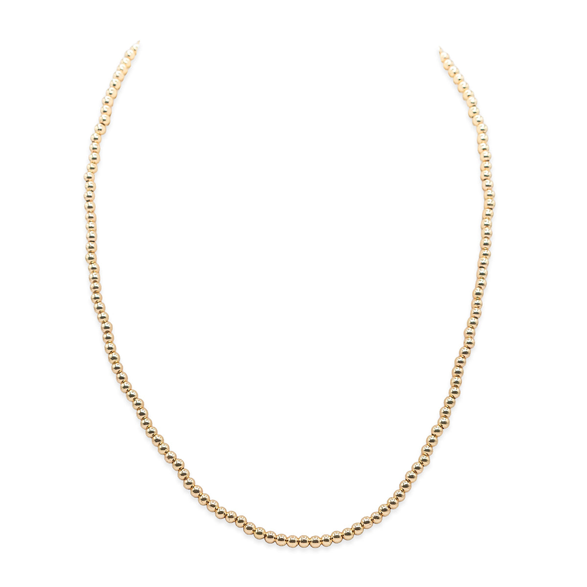 Gold chain necklace on a white background