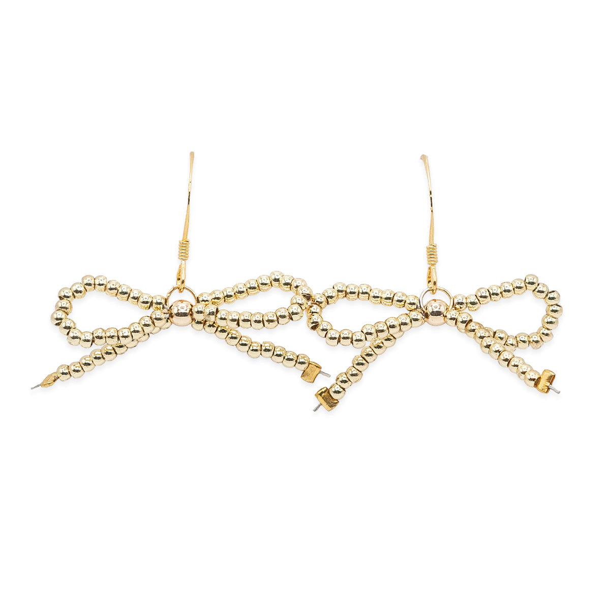 Gold bow-shaped hair accessory on a white background