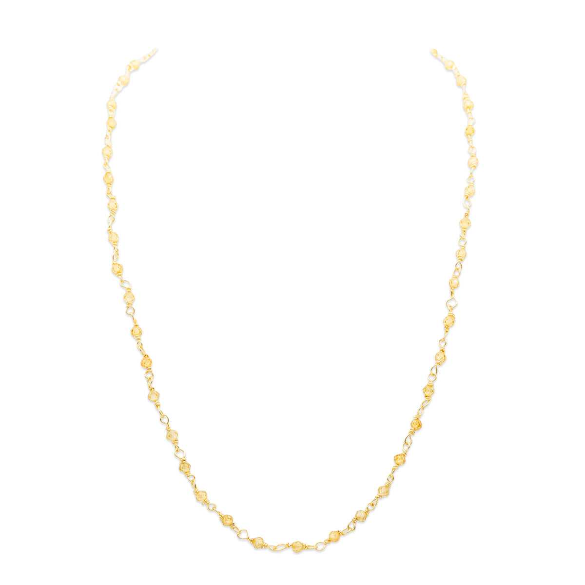 Gold necklace on a white background