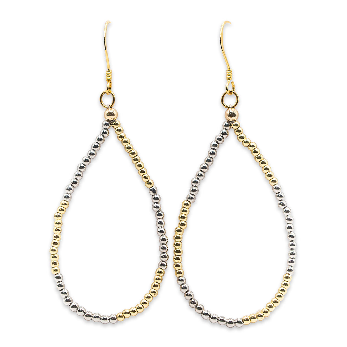 Pair of gold and silver teardrop-shaped earrings on a white background
